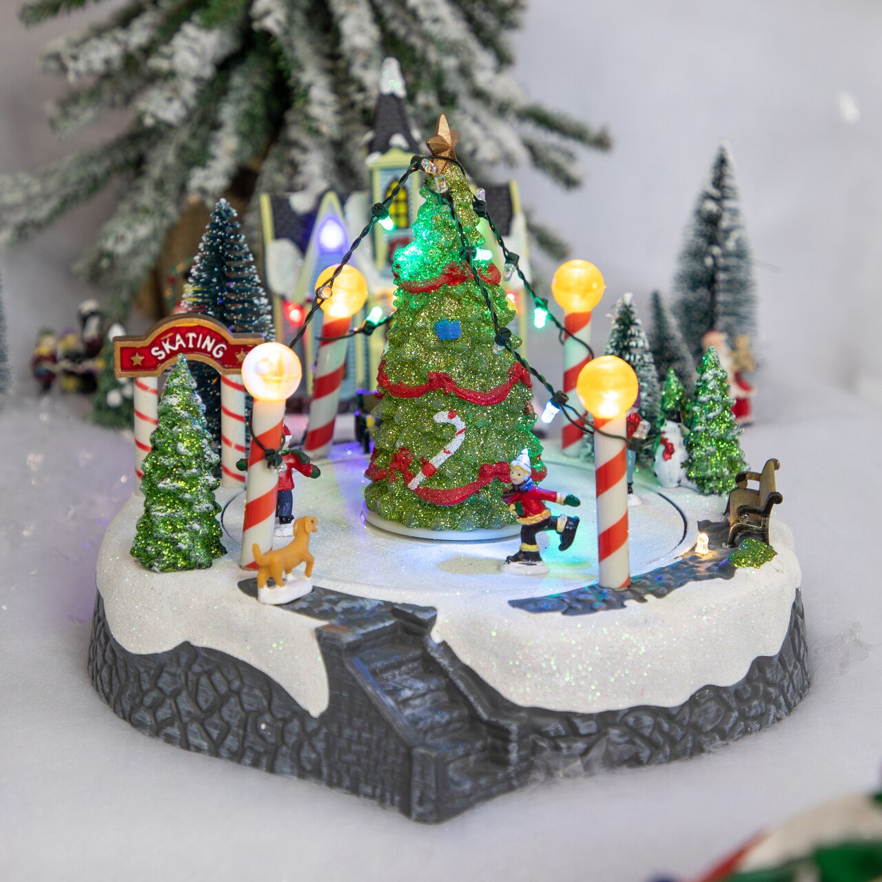 Northlight Animated and Musical Ice Skaters Christmas Scene LED Lighted Village Display - 9"